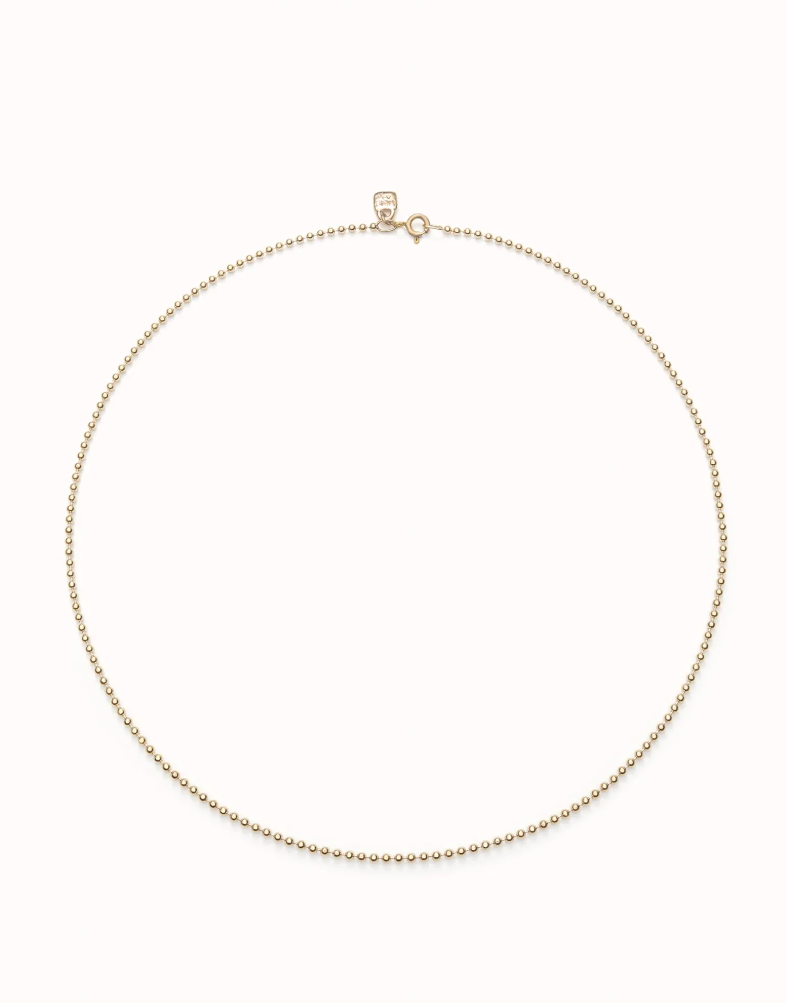 Cadena media con bolas bañada en oro 18k