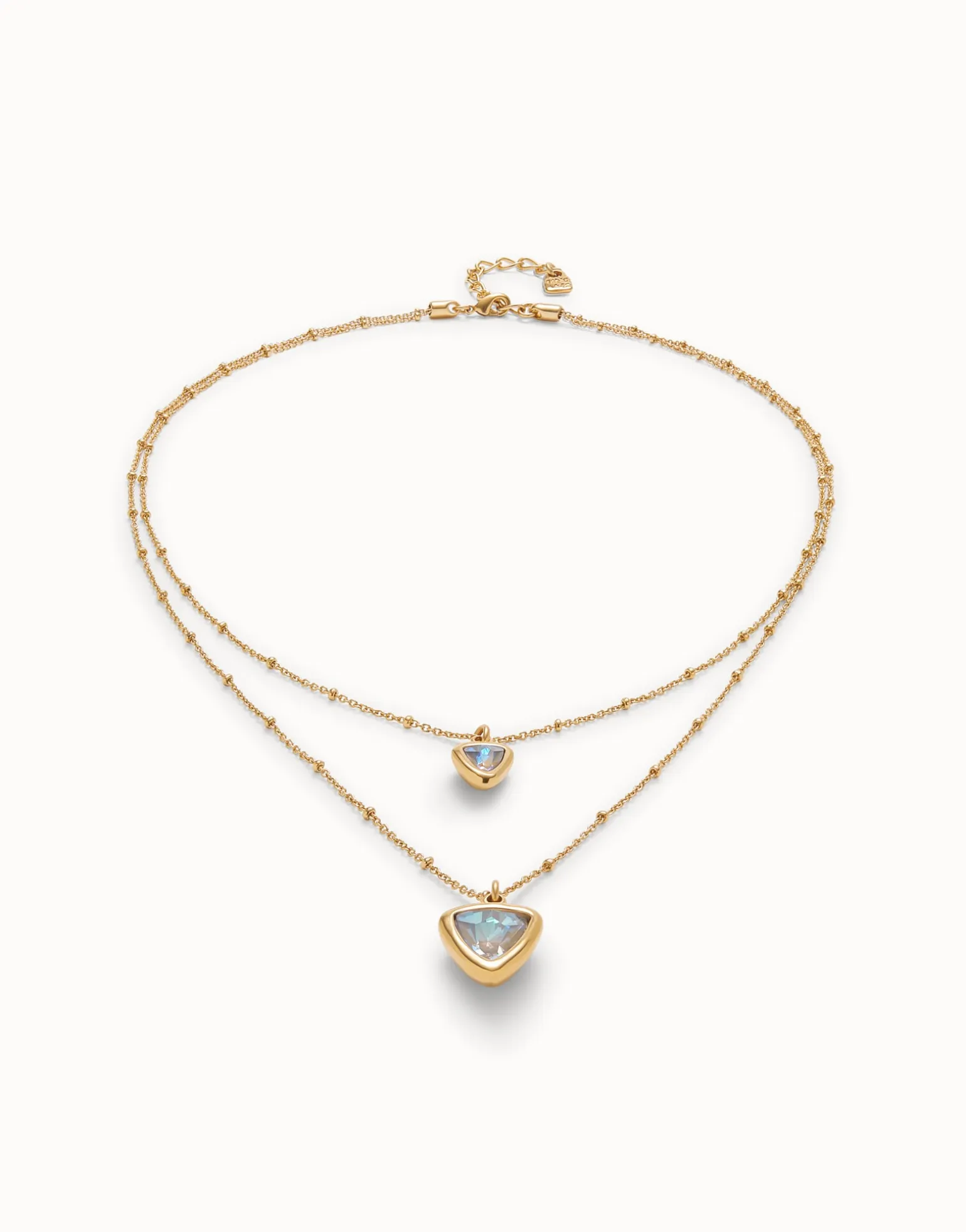 Colgante bañado en oro 18k con doble cadena y triángulo de cristal