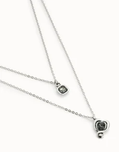 Colgante bañado en plata de ley con doble cadena y corazones con cristal negro