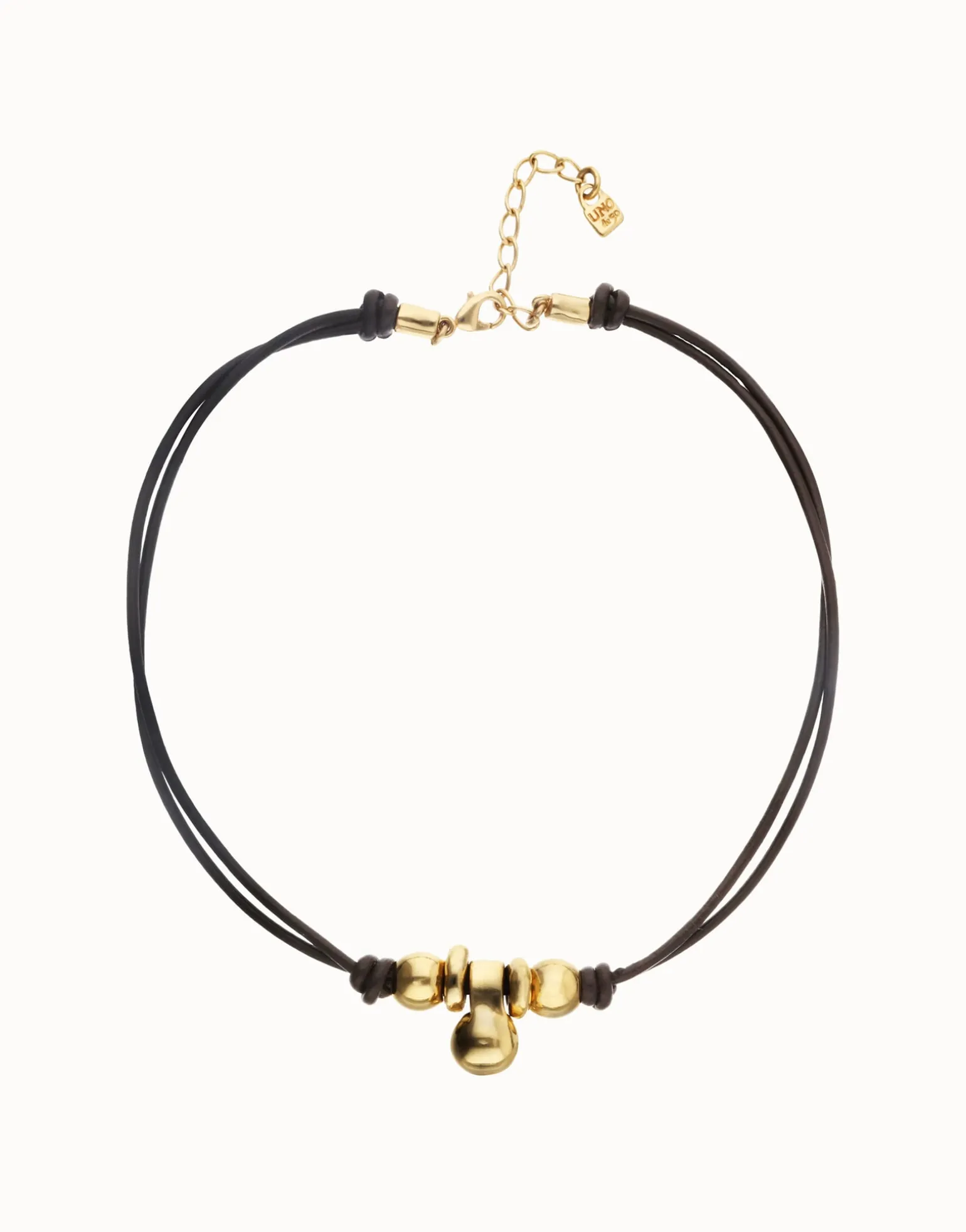 Collar de cuero con tres esferas bañadas en oro 18k