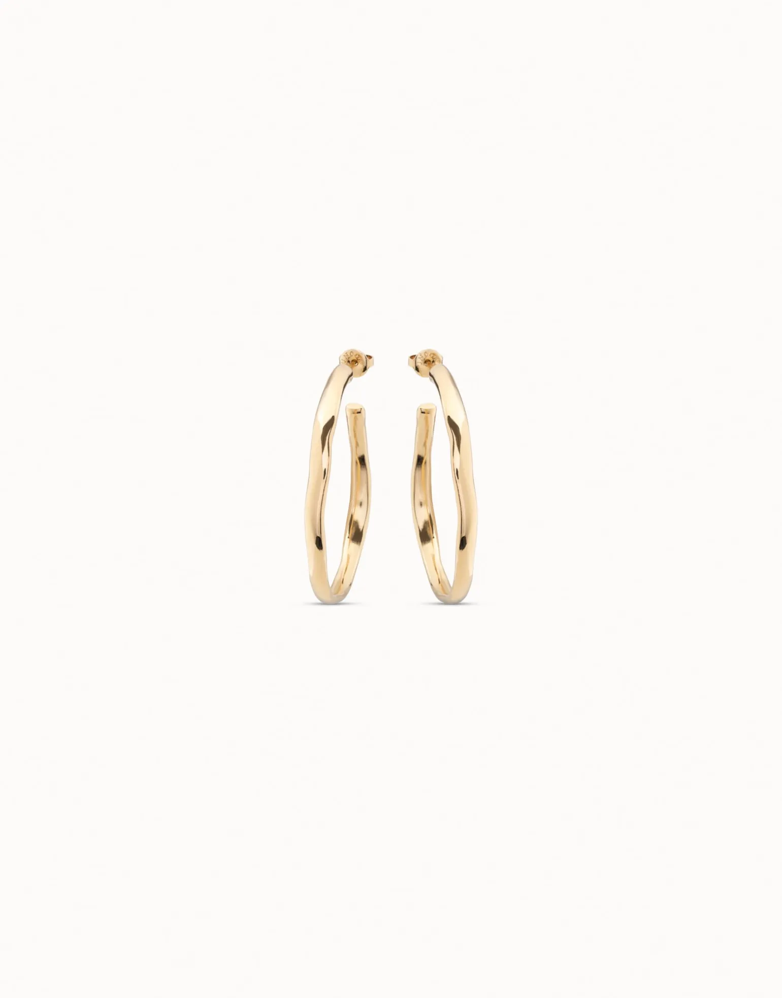 Pendientes de aro abierto bañados en oro de 18k