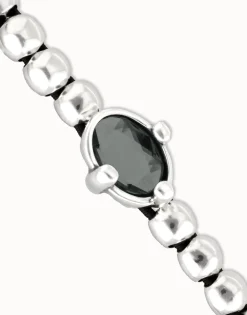 Pulsera de bolas bañada en plata con cristal facetado ovalado negro
