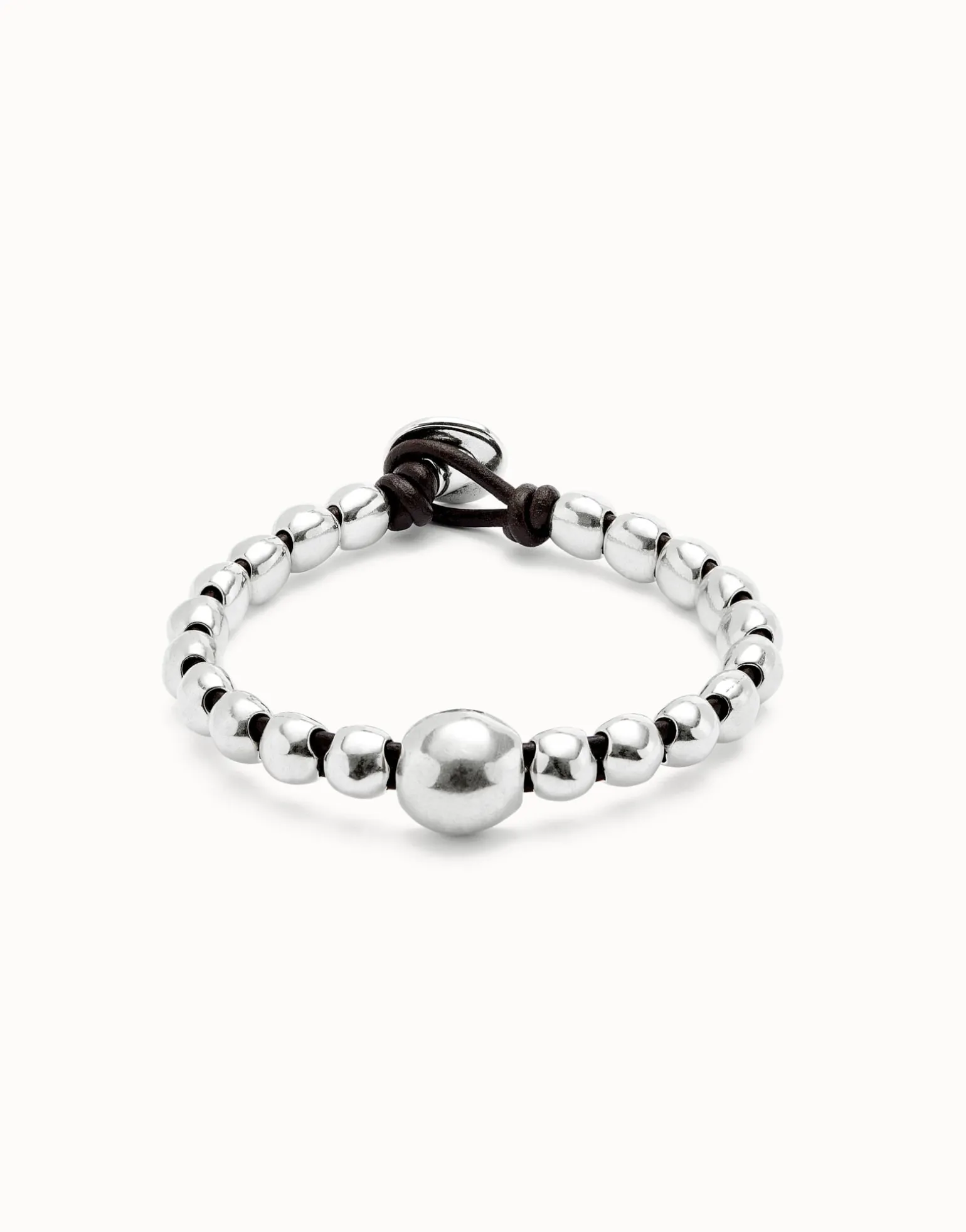 Pulsera de bolas bañadas en plata de ley y bola central de mayor tamaño