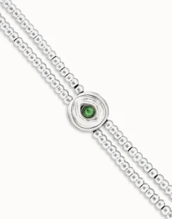 Pulsera de bolas doble bañada en plata de ley con detalle de ojo y cristal verde