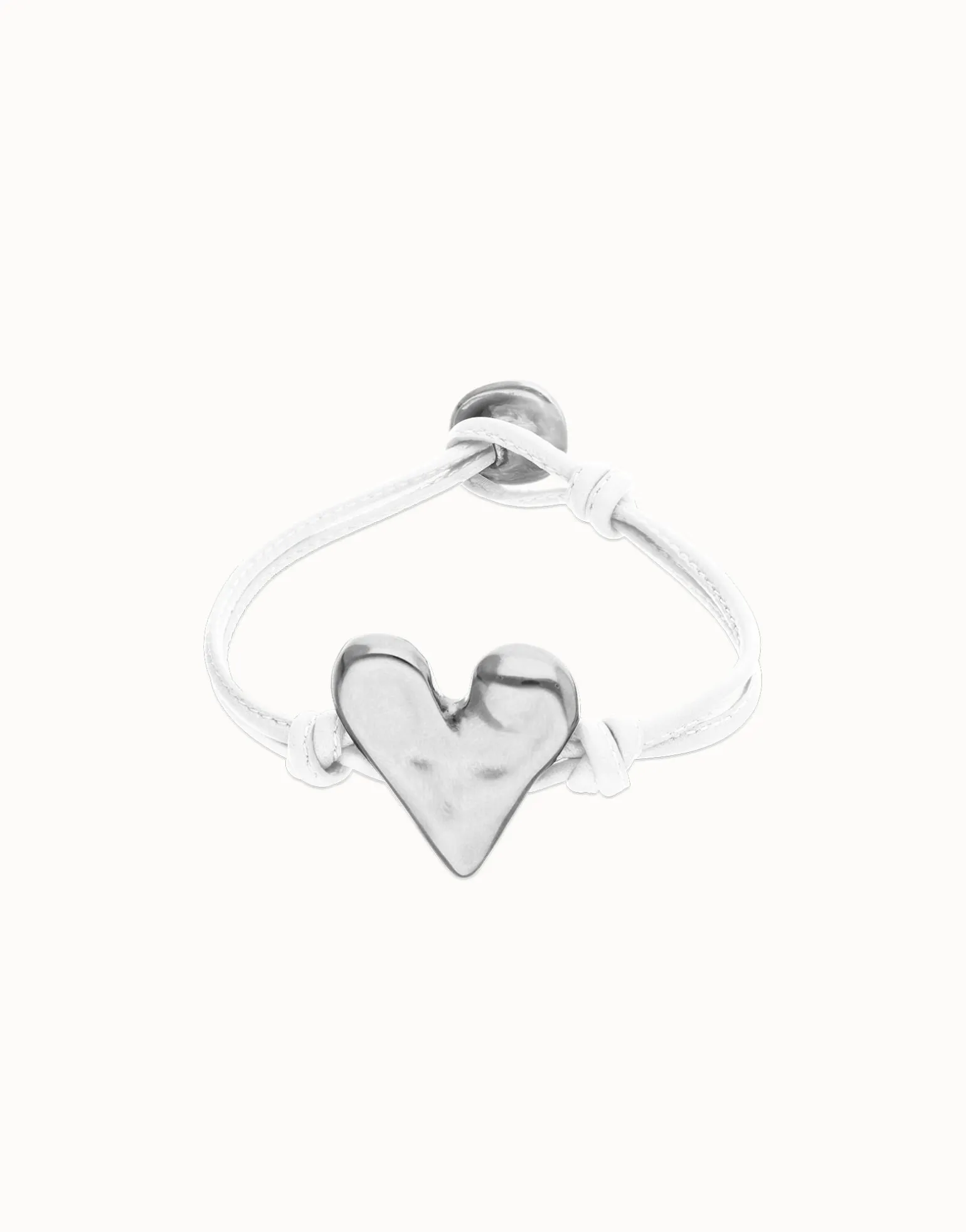 Pulsera de cuero blanco con detalle de corazón bañado en plata de ley