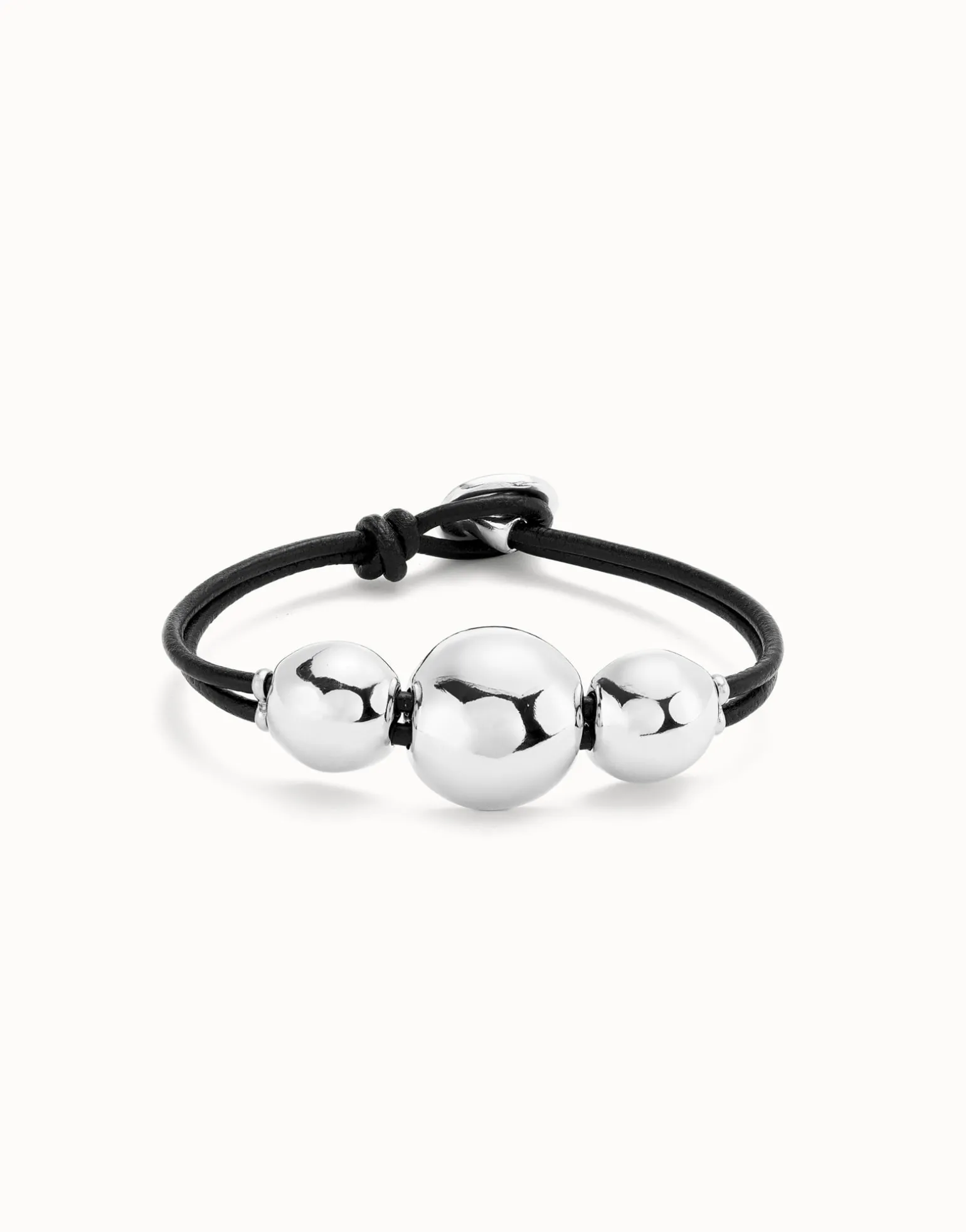 Pulsera de cuero con tres bolas grandes bañadas en plata de ley