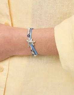 Pulsera de hilo de seda en color azul bañada en plata con estrella de mar