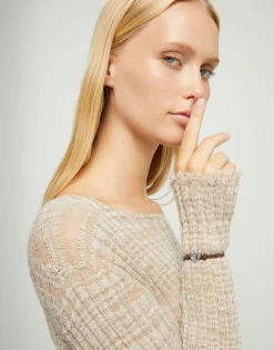 Pulsera de hilo elástico marrón con corazón bañado en plata de ley