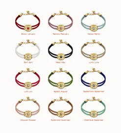 Pulsera doble de cuero blanco con ojo bañado en oro 18k