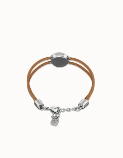 Pulsera doble de cuero crema con ojo bañado en plata de ley