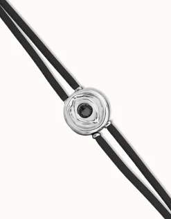 Pulsera doble de cuero negro con ojo bañado en plata de ley