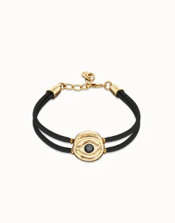 Pulsera doble de cuero negro con ojo bañado en oro 18k
