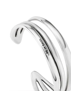 Pulsera rígida triple con curvas bañada en plata de ley