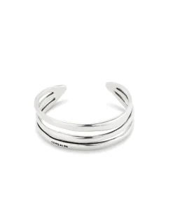 Pulsera rígida triple con curvas bañada en plata de ley